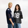Black loose fit pullover top with white letter pattern and short sleeves