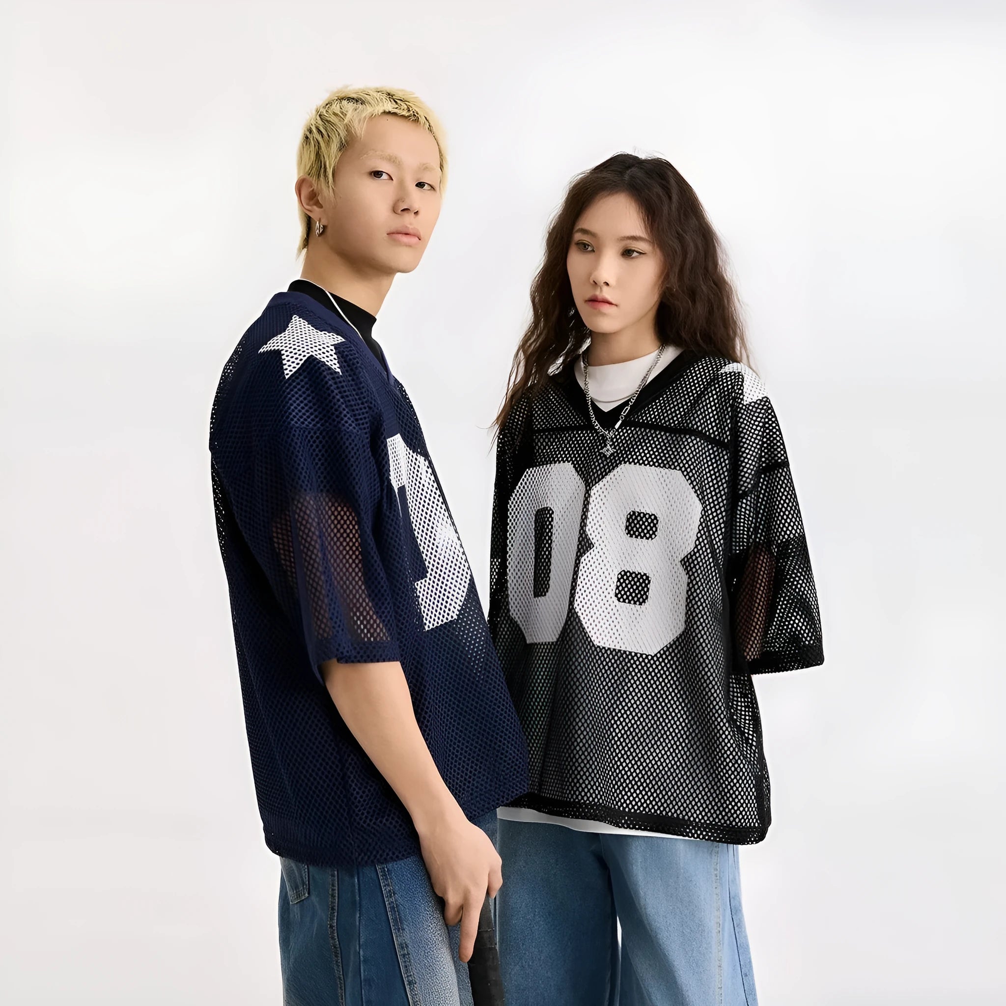 Black loose fit pullover top with white letter pattern and short sleeves