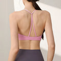 Women's nylon sports vest with double shoulder straps in various colours for athletic activities