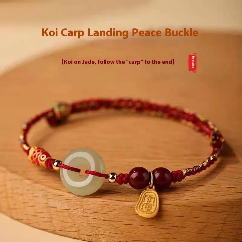 Hetian Jade peace buckle bracelet with koi fish charm on braided rope