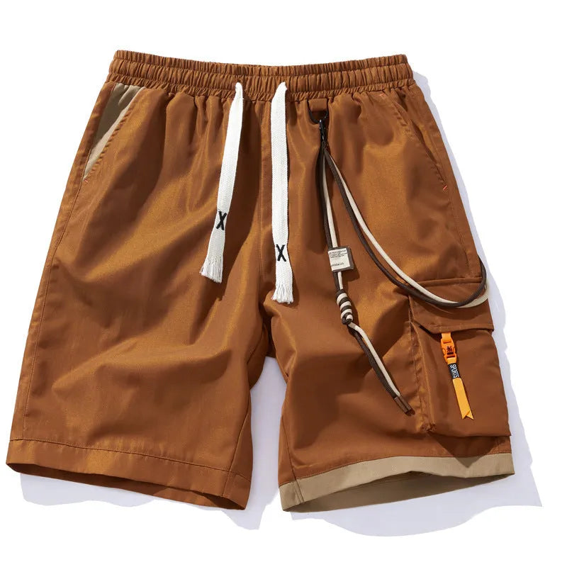 Man wearing coffee-coloured plus size bamboo fibre sports shorts with a high waist and straight leg.