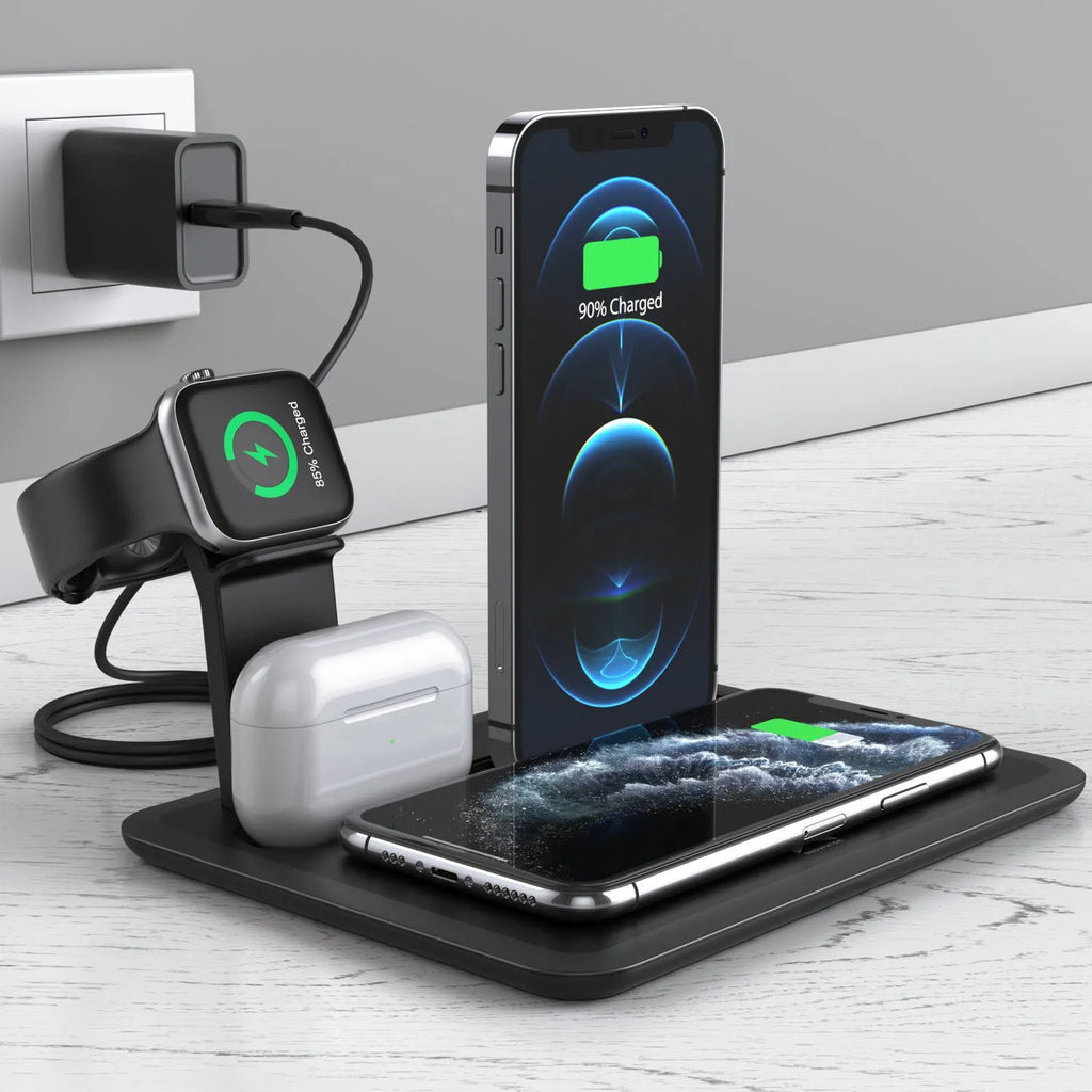 Black multi-device wireless charging stand holding a phone, headphones, and a smartwatch on a desk.