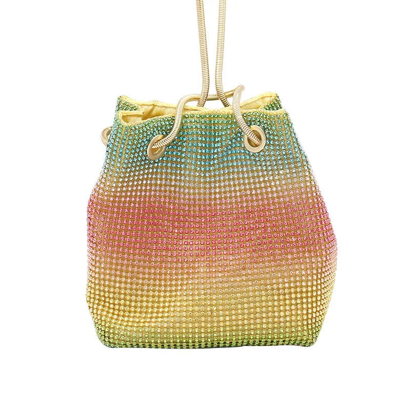 Colourful rainbow rhinestone bucket bag with a single shoulder strap.
