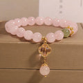 Pink crystal four-leaf clover pendant women's bracelet with alloy inlay and rhinestone details