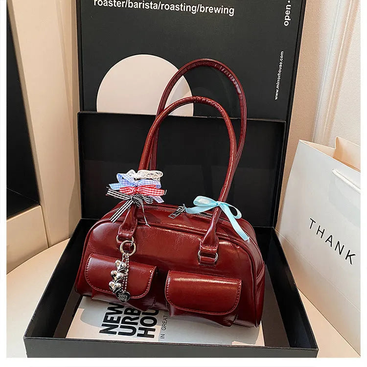 PU leather women's pillow-shaped handbag with double shoulder strap and retro flap closure