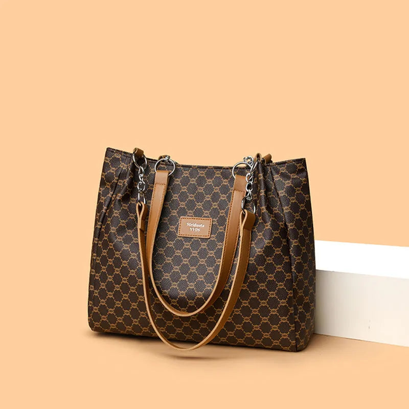 Women's retro fashion handbag in soft brown PU leather with shoulder strap.