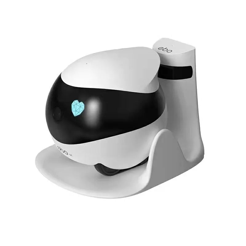 White smart home mobile surveillance robot camera on a docking station.