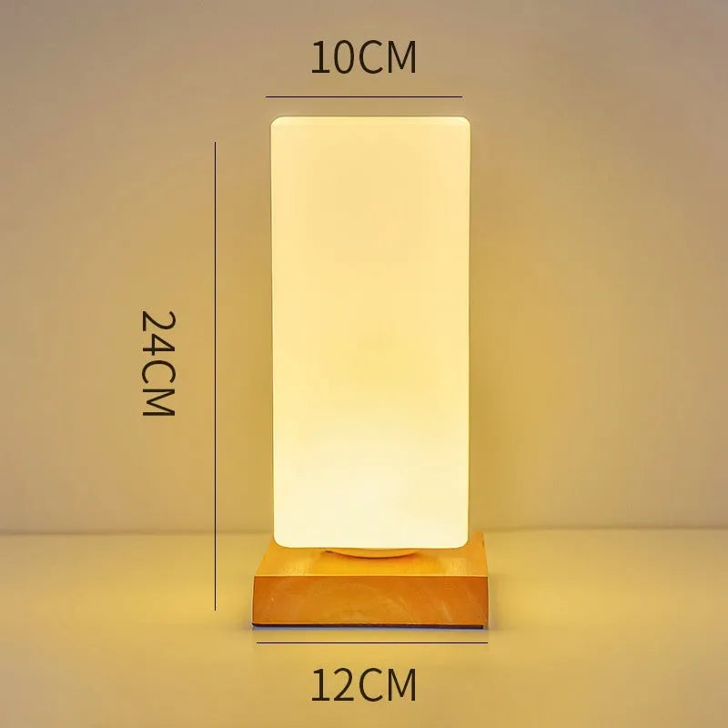 Nordic solid wood USB table lamp with touch control in geometric shapes on wooden surface