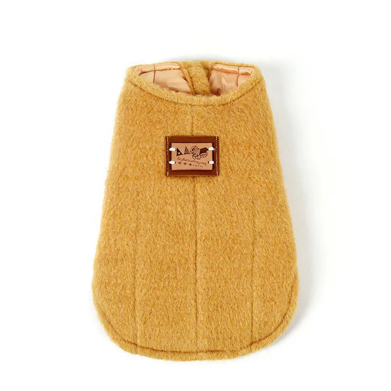 Small dog wearing a yellow knitted cotton winter vest, showcasing the Korean-style casual design.