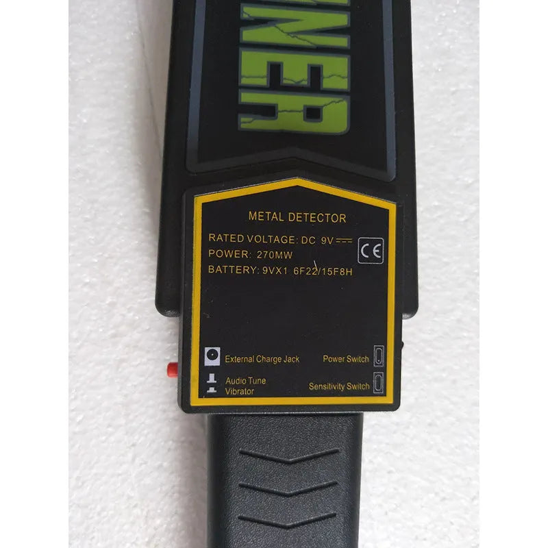 Black handheld metal detector with leather carrying case, 410mm length, for security screening