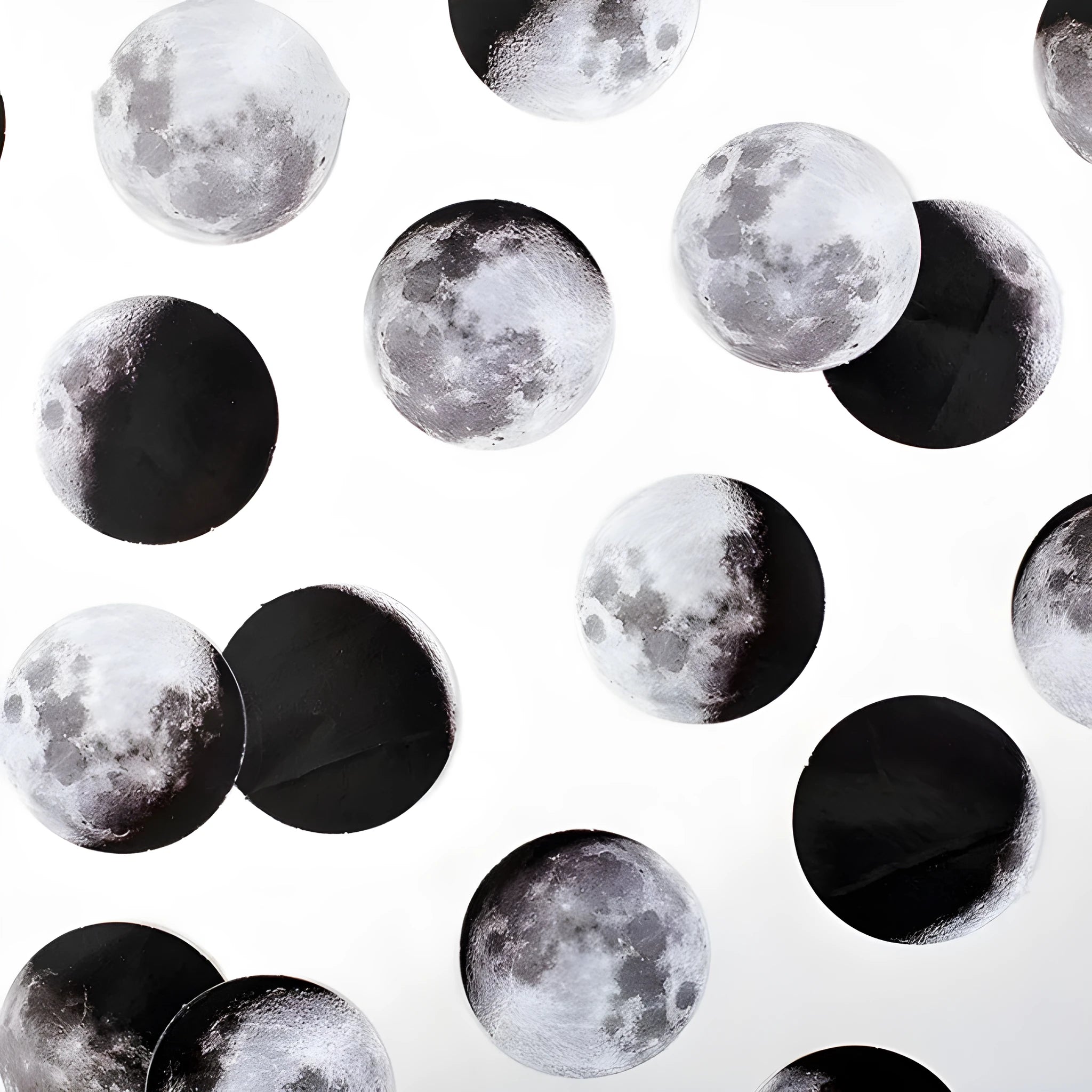 Box containing 45 black moon phase and planet calendar stickers on self-adhesive paper.