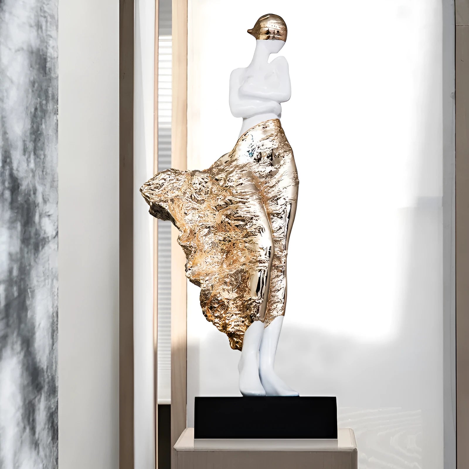 48cm tall resin sculptured ornament in rose gold metallic finish with modern abstract character design