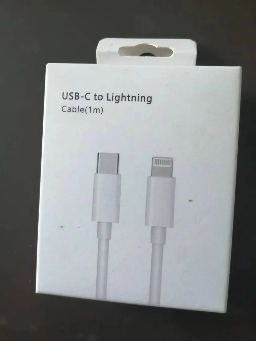 White 20W USB-C UK wall charger with a fixed three-pin plug and a USB-C cable.
