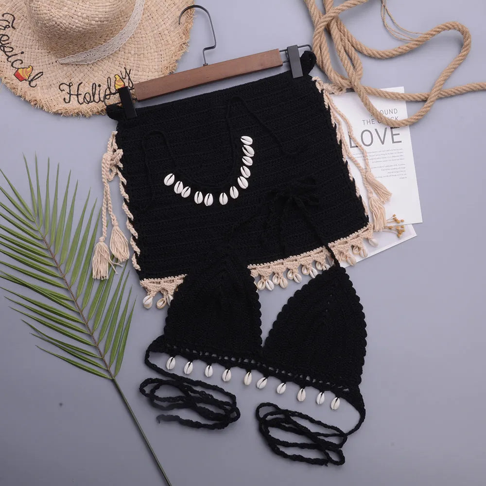 Women's split swimsuit with lace-up front and matching short skirt in cotton blend fabric.