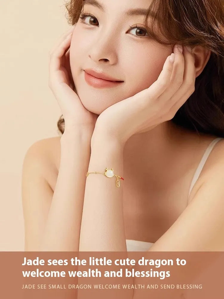Silver plated dragon zodiac bracelet with Hetian jade detailing on wrist