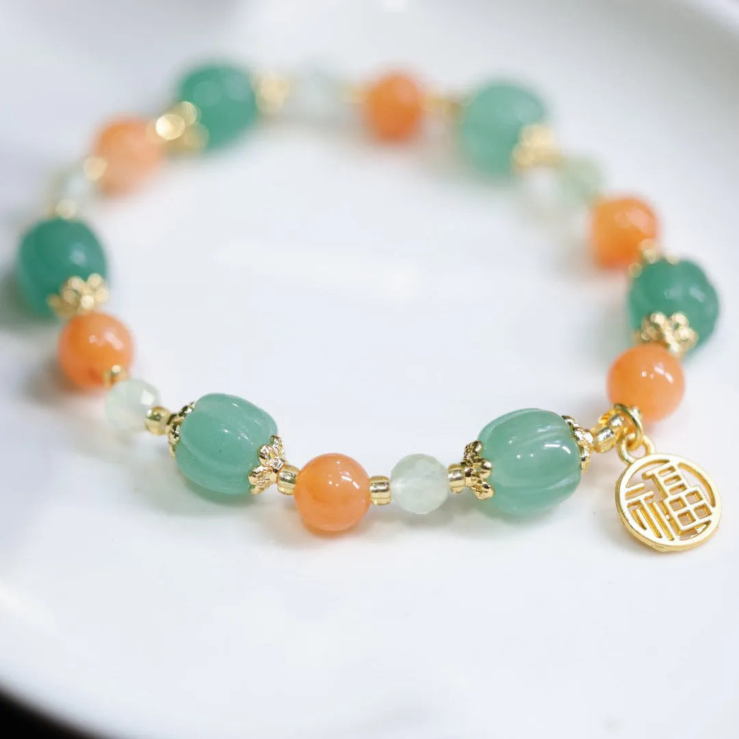 Women's Chinese style Duobao pumpkin bracelet made of Jinsi Jade and Prehnite beads.