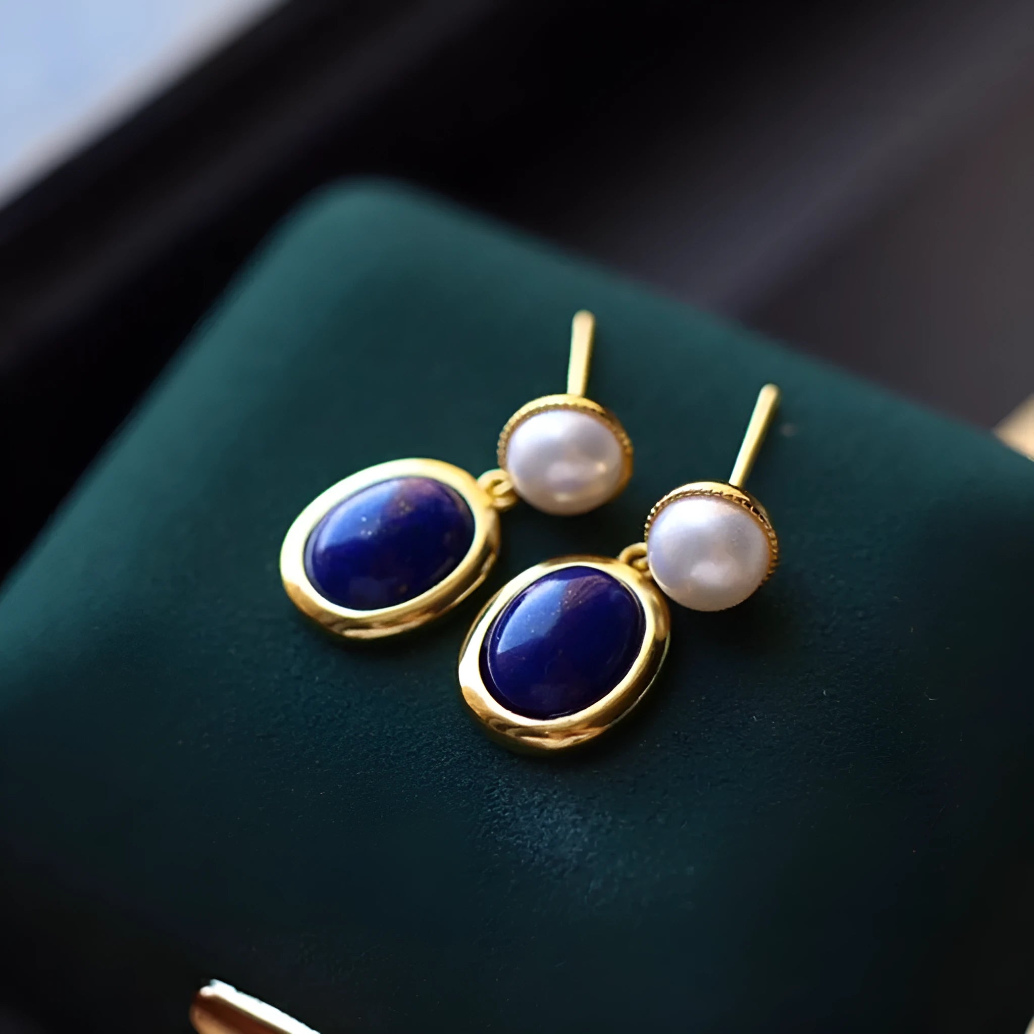 Lapis lazuli pearl stud earrings in 925 silver with auspicious pattern detailing