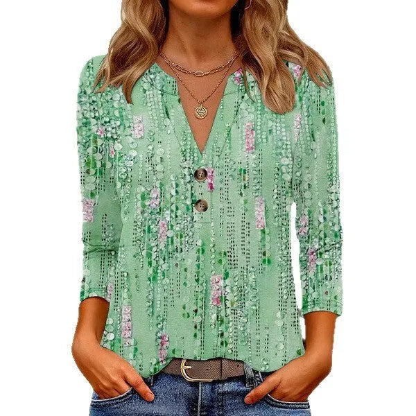 Women's loose-fit casual V-neck top with a 3D printed pattern, available in multiple colours.