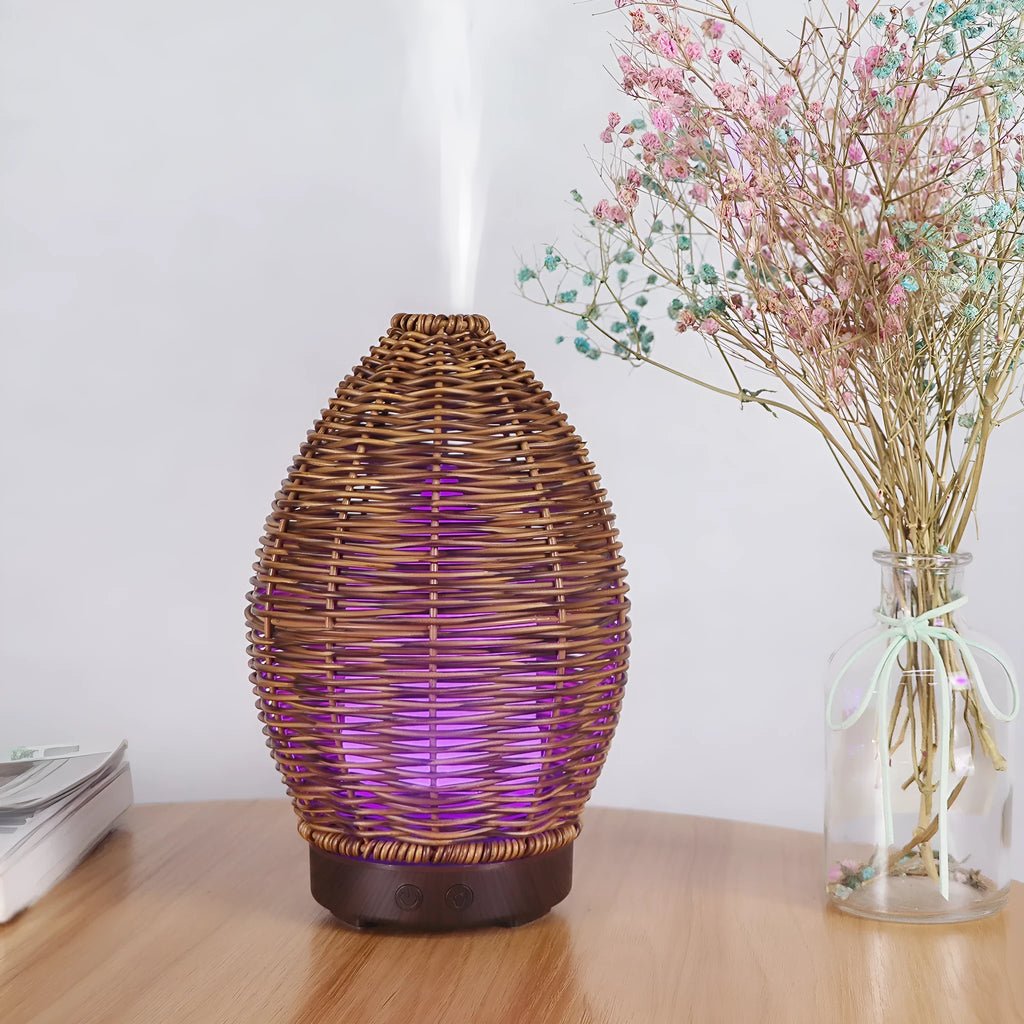 Hollow rattan aroma diffuser with light wood grain base, 100ml capacity for essential oils