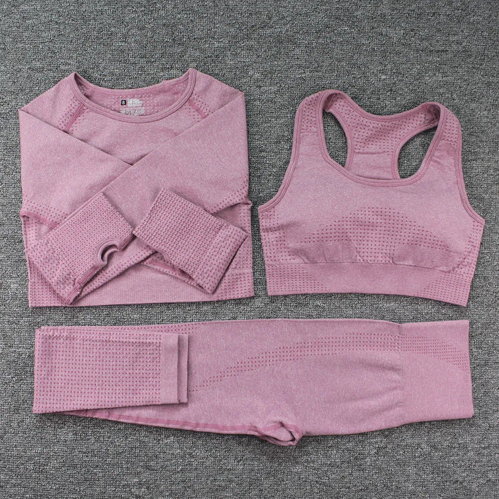 Three-piece yoga suit with long sleeve top, trousers, and bra in nylon blend, tight fit, sizes S to XL