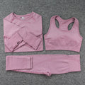 Three-piece yoga suit with long sleeve top, trousers, and bra in nylon blend, tight fit, sizes S to XL