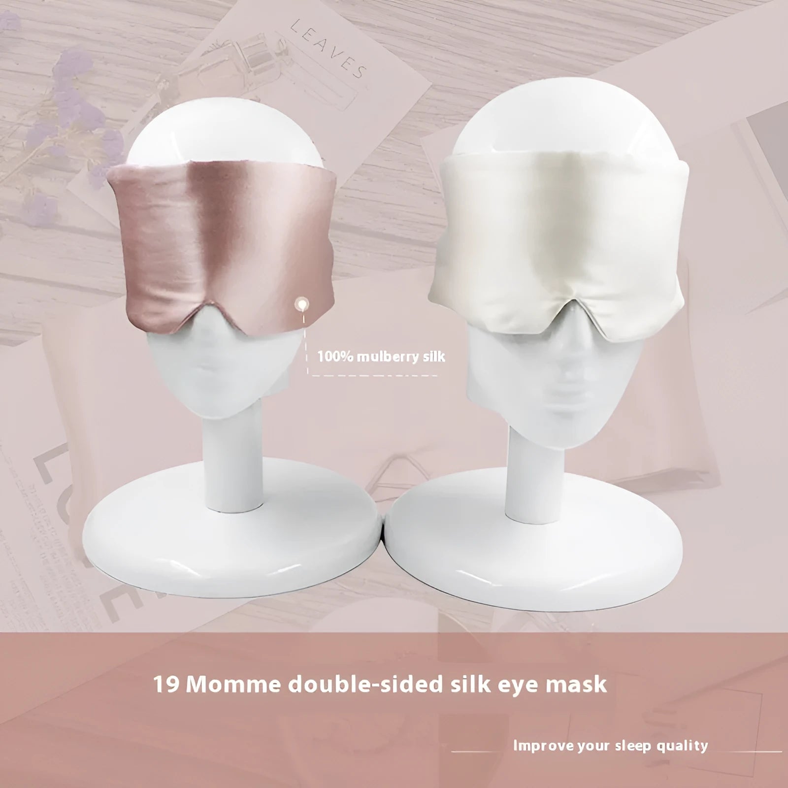 Black mulberry silk sleep eye mask on a white background.