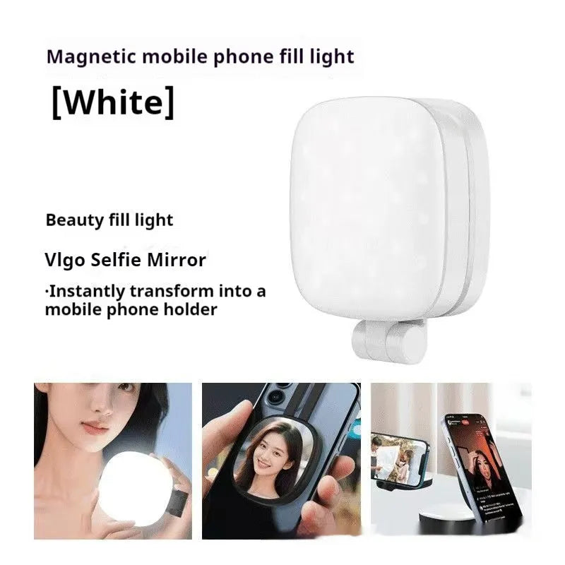 Black and white mini portable fill light with magnetic phone holder showing three colour temperature settings