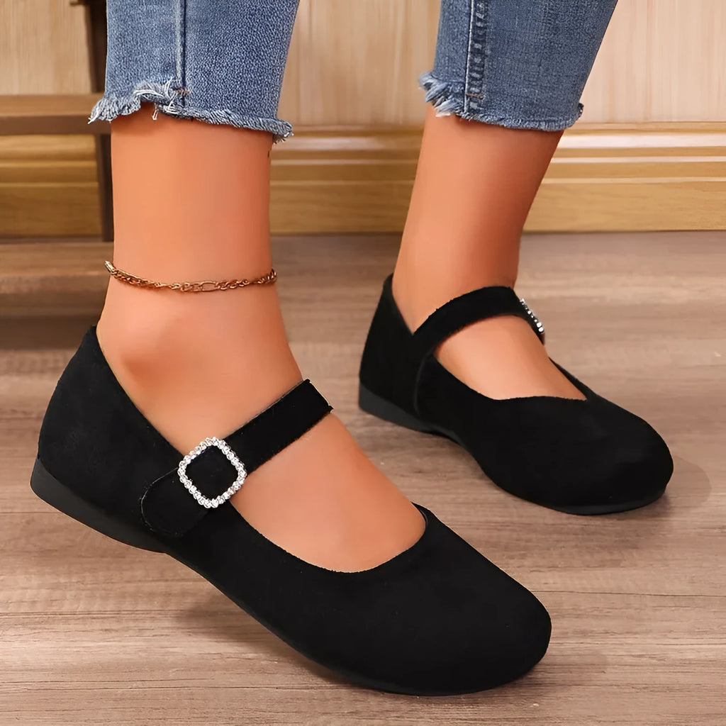 Black canvas fisherman shoes with low-top design and rubber soles