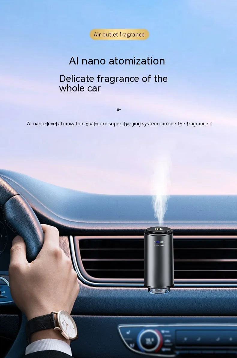 Smart car vent clip aroma diffuser in obsidian black with three bottles of essential oil