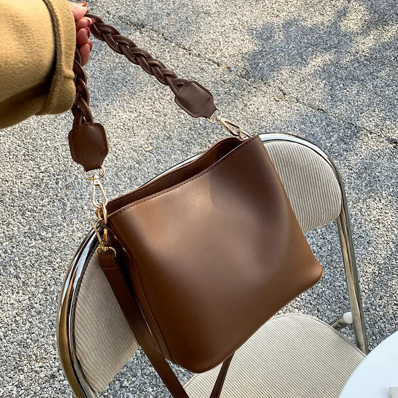Retro woven PU leather one-shoulder crossbody underarm bucket bag in khaki colour.