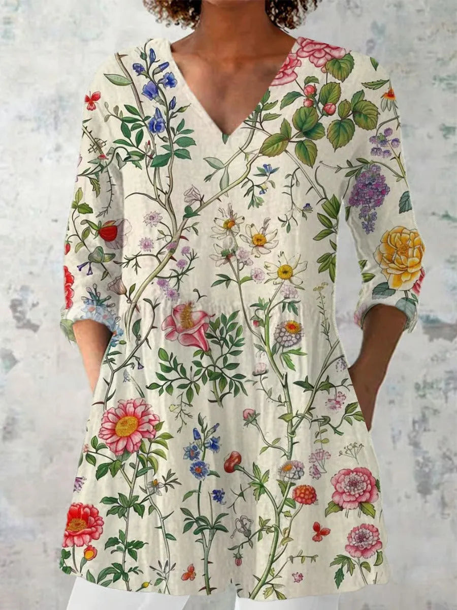 Women's retro-style slim fit long-sleeved top with a printed pattern, shown in a selected colour.