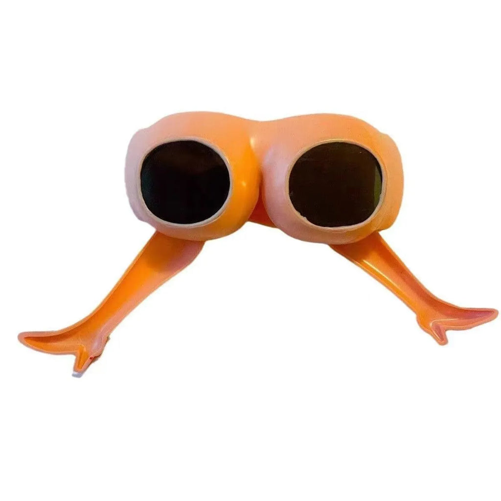 Orange plastic novelty sunglasses designed in the shape of a hip and leg.