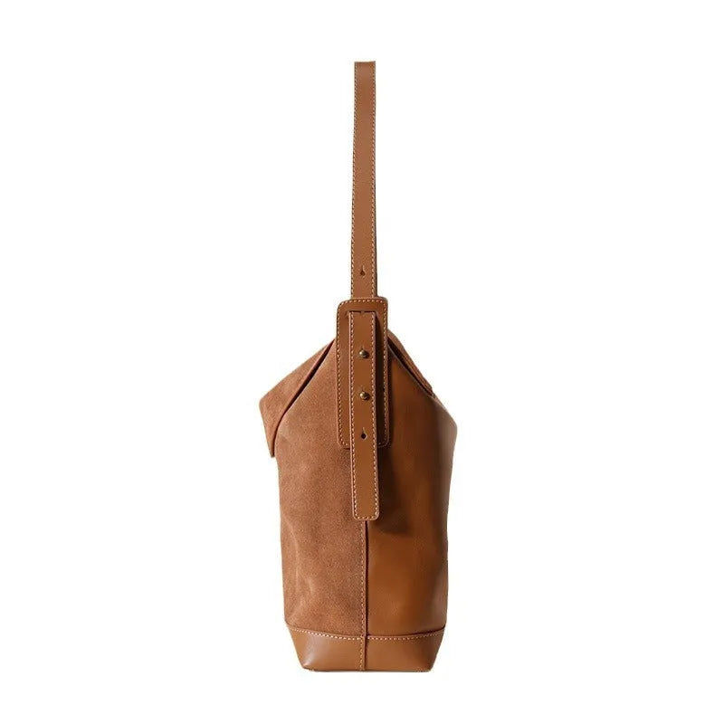Light brown genuine leather retro style women's shoulder bag with clamshell opening.
