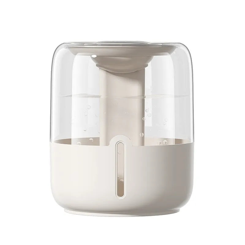 Beige round USB humidifier with display screen and dual mist outlets on a table