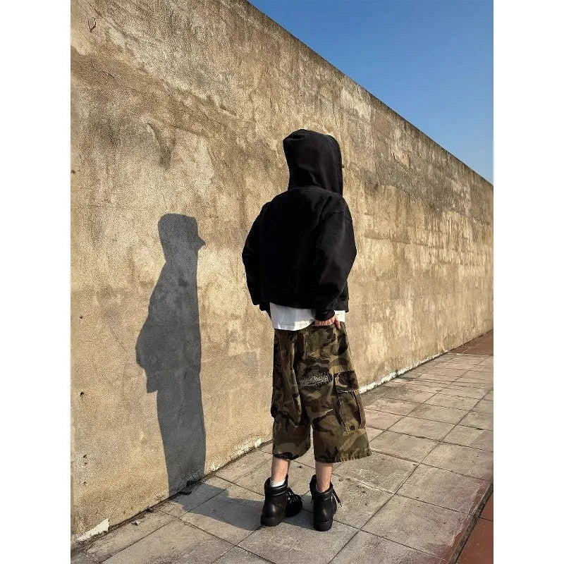 Men's camouflage cropped jeans with retro patches and ripped knees in straight cut loose fit