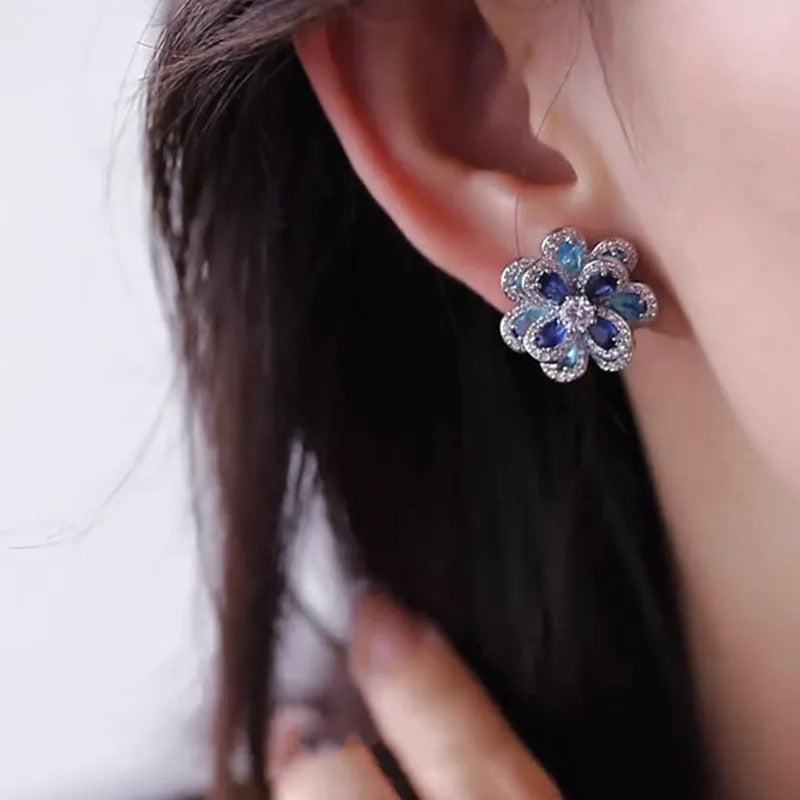 Blue flower stud earrings for women with shiny diamond detailing and zinc alloy electroplated construction