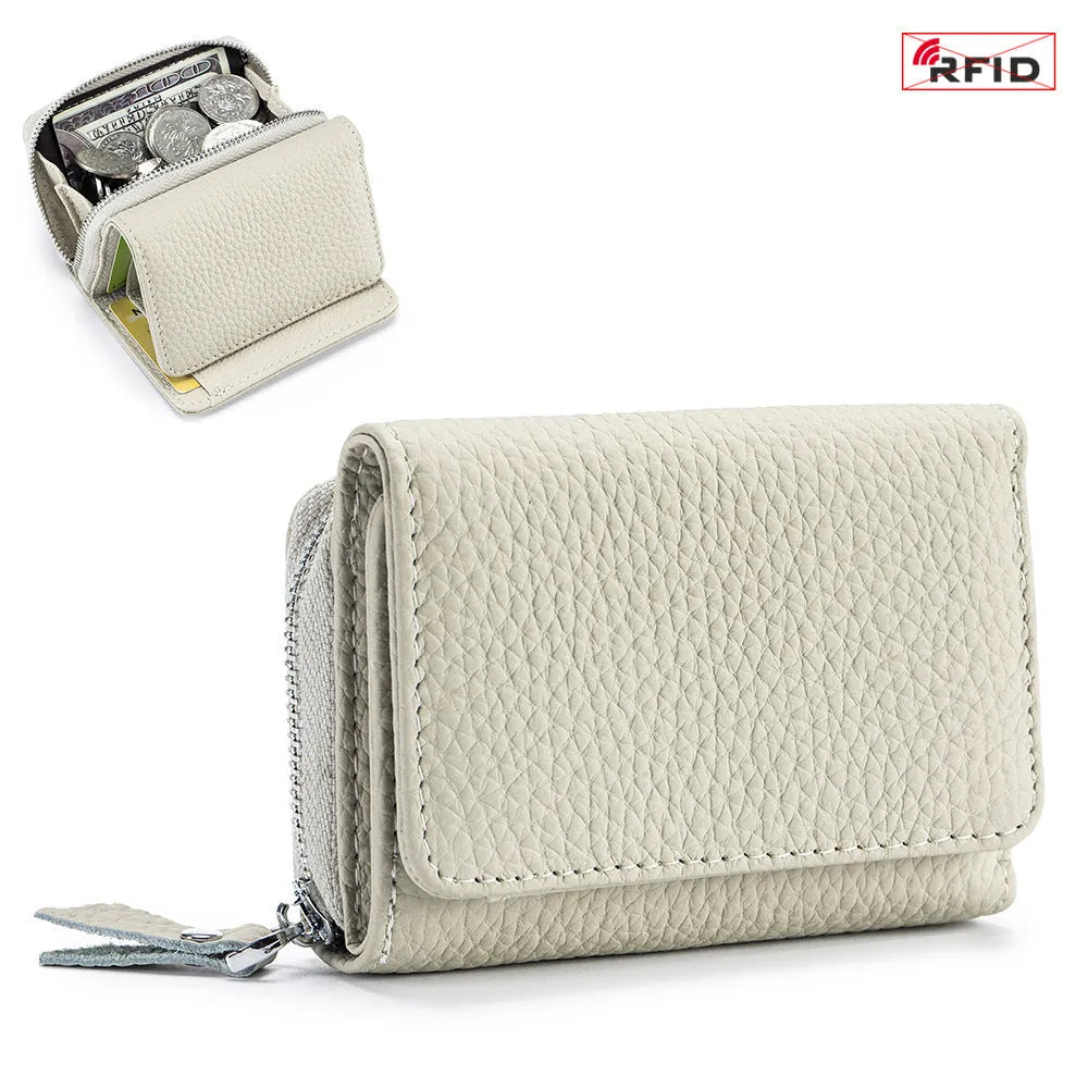 Women's leather tri-fold mini RFID wallet in elephant gray, 10x4x7.5cm, with sewing thread detailing