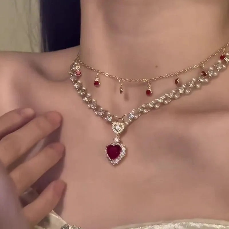 Red love heart double layer twin necklace on a regular chain, adjustable from 41cm to 50cm.