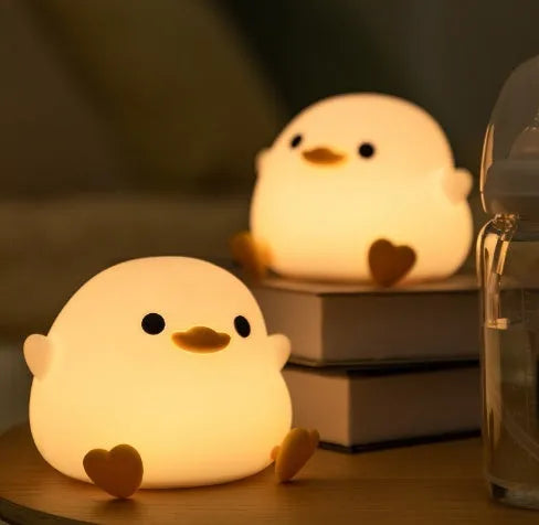 Seagull-shaped silicone night light for babies with soft glow and tap controls