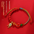 Hand-woven cinnabar peace blessing bracelet with buckle closure in emperor red sand colour