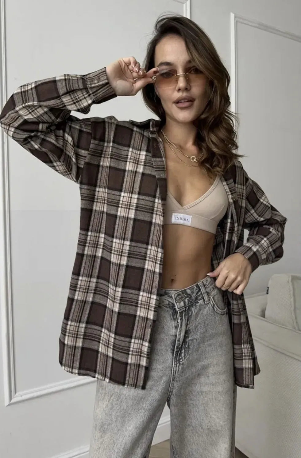 Dark brown striped women's shirt with retro styling and long sleeves