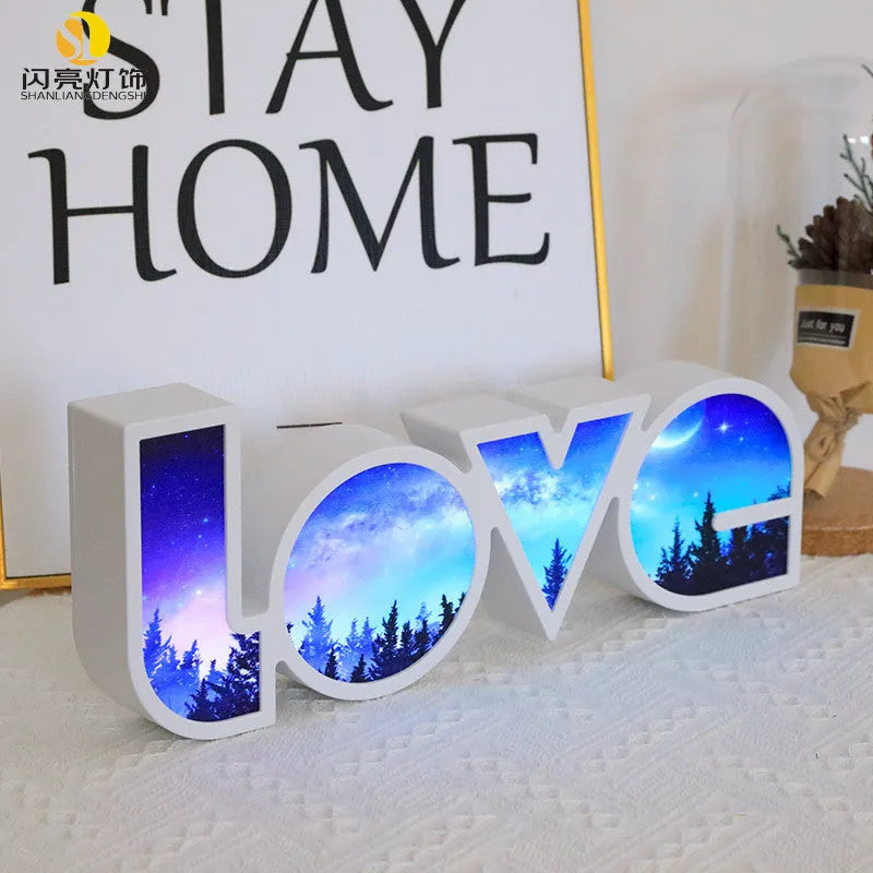 LED LOVE light with rainbow style plastic lampshade showing 'LOVE' word decoration