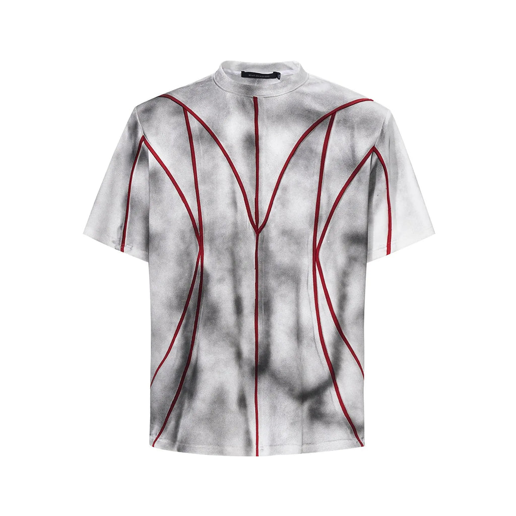 Padded shoulder short sleeve T-shirt with three-dimensional line patchwork design and round neck.