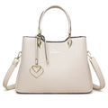 Women's black PU leather messenger bag with shoulder strap and sewing thread detail.
