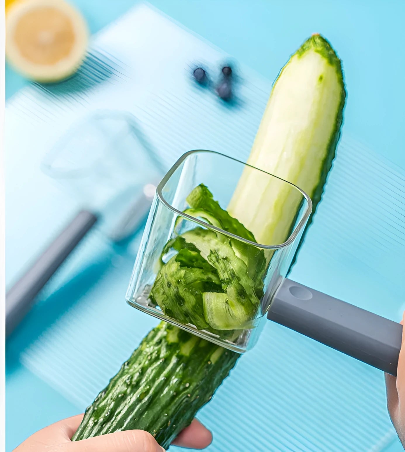 Stainless steel kitchen peeler with PP plastic handle in choice of green, grey, or red colours