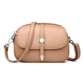 Women's oval crossbody shoulder bag in black, khaki or dark brown with visible sewing thread detail