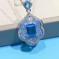 Sea blue copper geometry sky mirror pendant on plain background