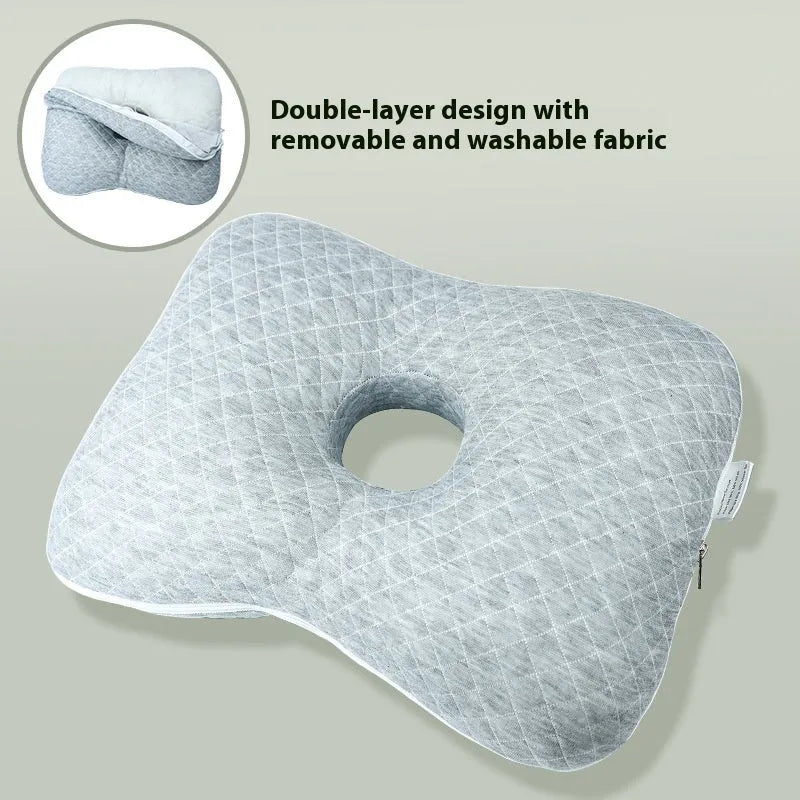 Beauty salon single hole ear pillow in Boer Grey colour on a treatment bed.