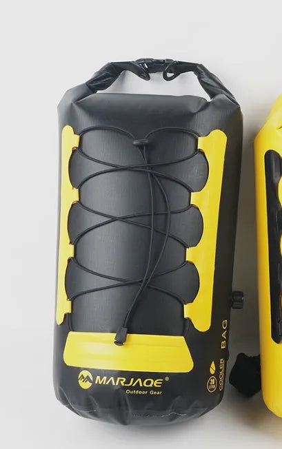 Yellow and black PVC dry bag with 20L capacity showing wet/dry separation compartments for water sports