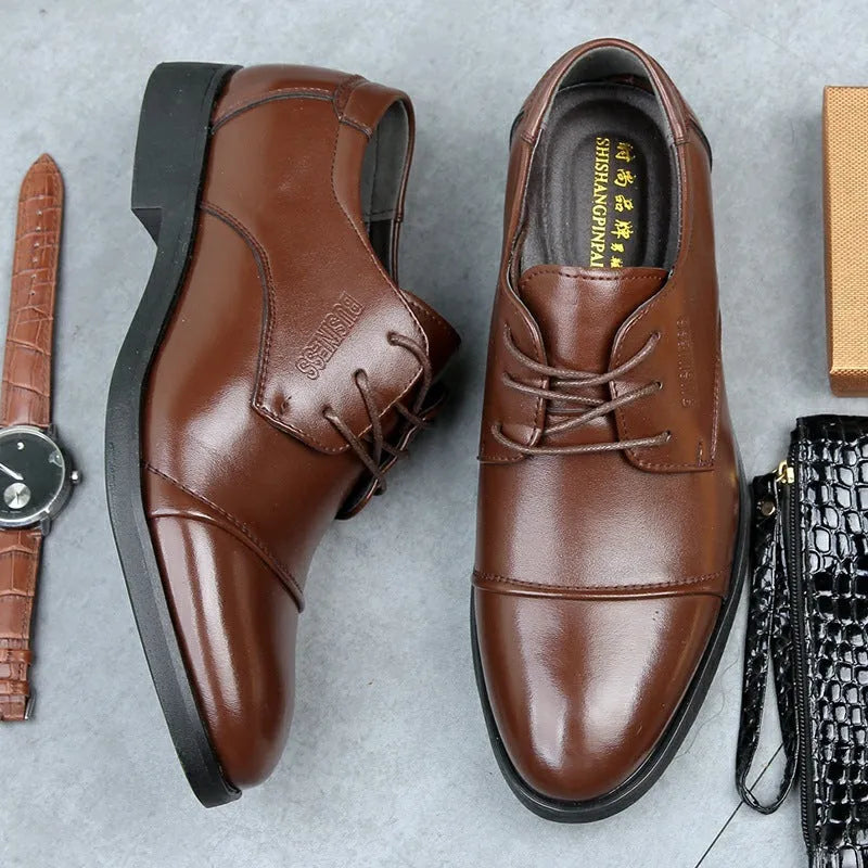 Men's black formal lace-up shoe with decorative stitching and a horse buckle on a rubber sole.